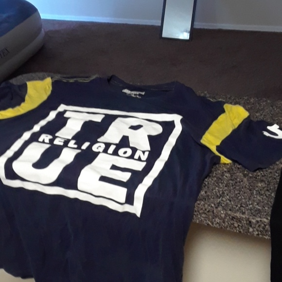 blue and yellow true religion shirt